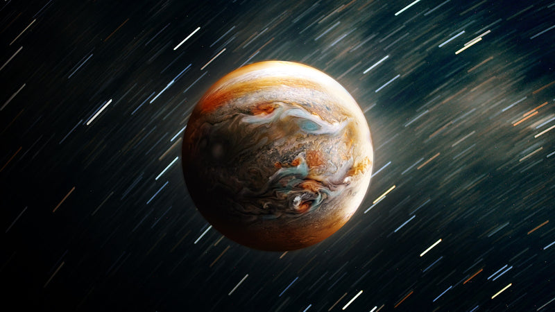 The planet Jupiter showing its banded cloud layers against dark space