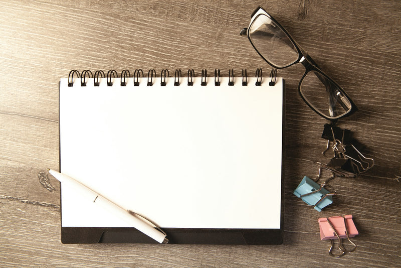 Notebook and pen on a study desk